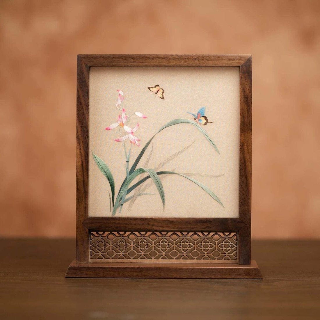 Small orchid and butterfly embroidered desk screen styled as a thoughtful hostess gift for the home