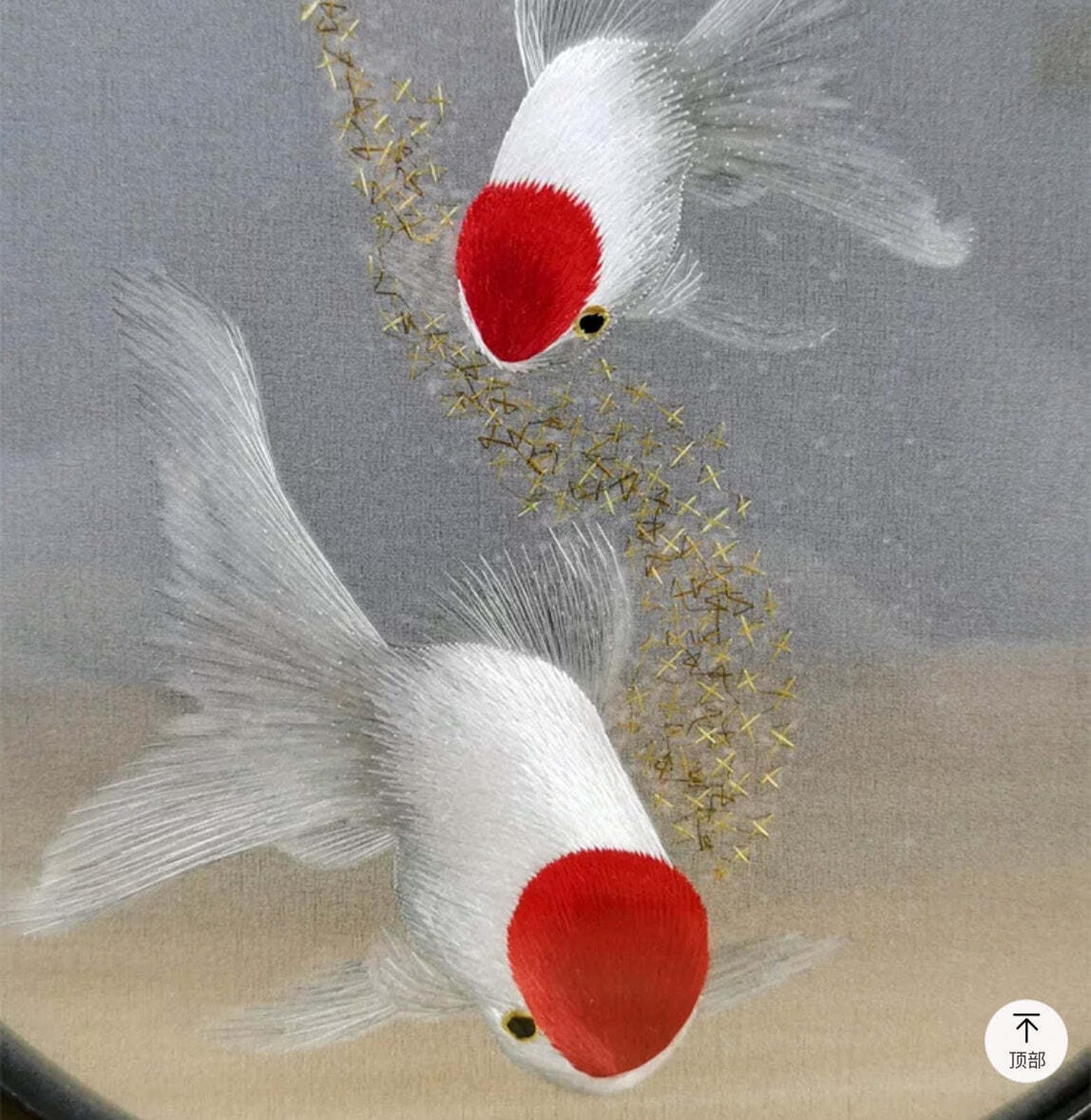 Double-sided Suzhou silk embroidery of goldfish displayed in a rotating wooden frame