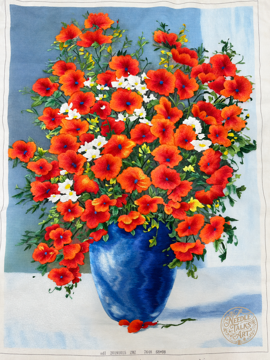 The Joy of Blooming unframed silk embroidery: red-orange and white flowers in a blue vase.