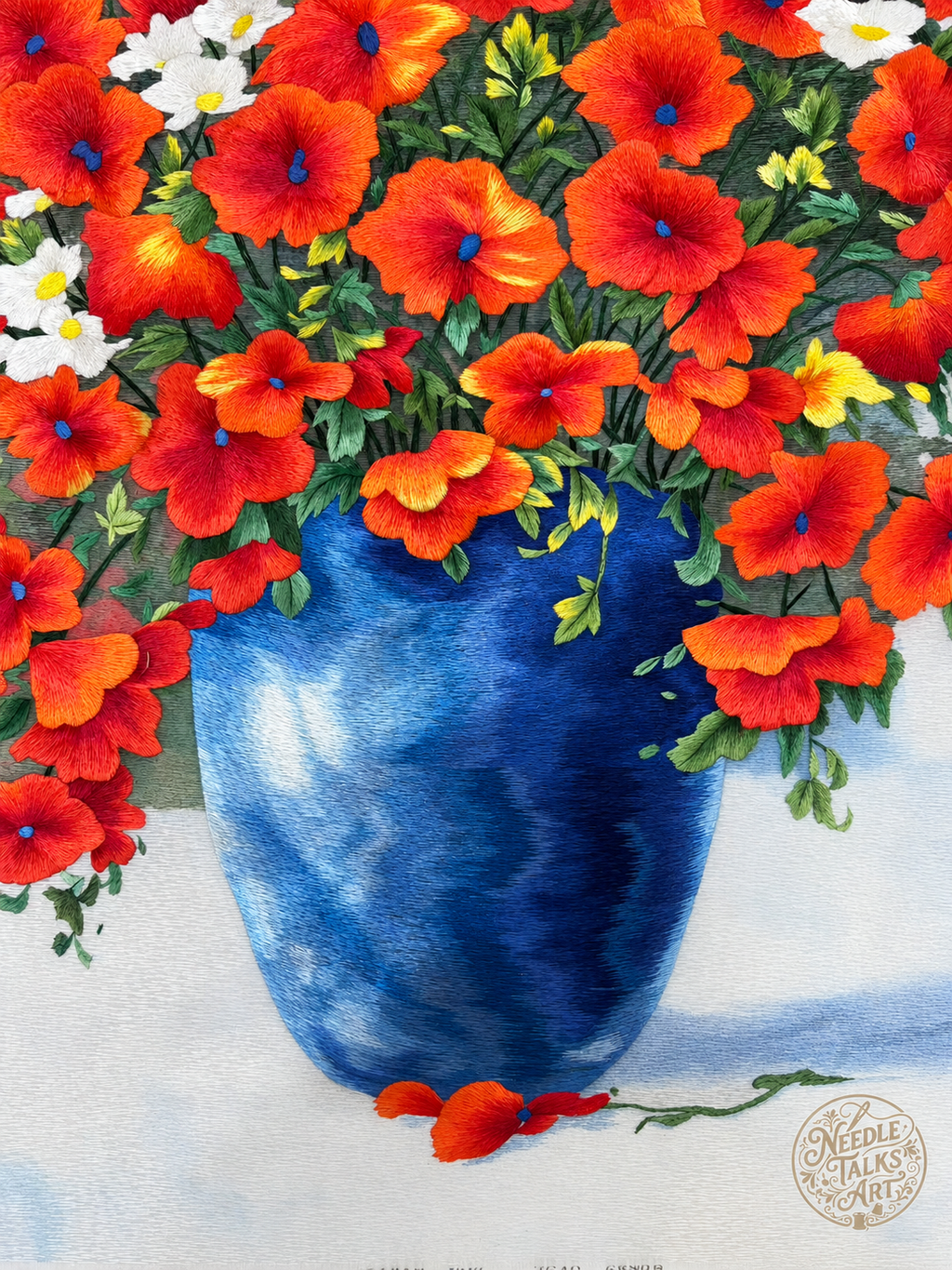 Detail of The Joy of Blooming showing red-orange flowers above a blue vase and fallen petals.