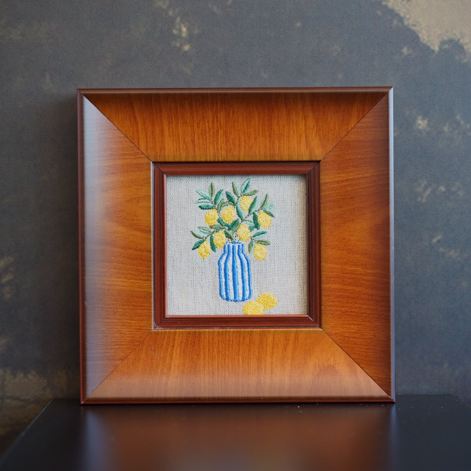 Handcrafted lemon embroidery wall art in a solid wood frame. Inspired by French Country and Mediterranean décor, perfect for