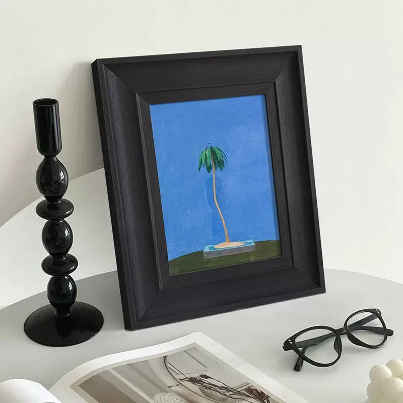 Minimalist Surrealist Palm Tree Canvas Print in Solid Black Wood Frame