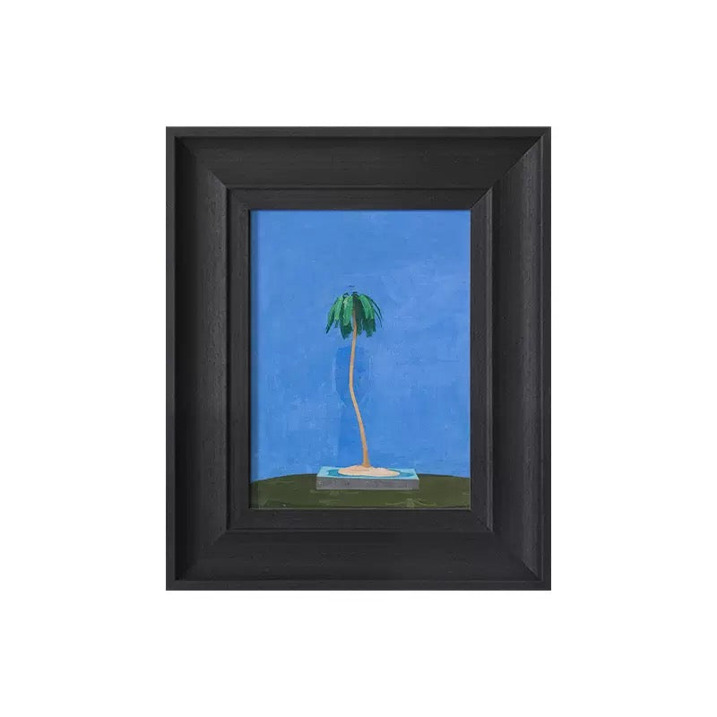 Framed palm tree art print in a bold black frame. A versatile piece of wall art for modern interior design, suitable as a bir