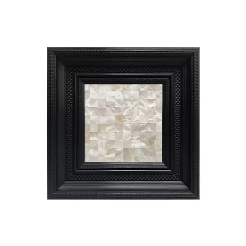 A Chinoiserie style framed art piece. The black frame carved like bamboo nodes encases a luminous pearl shell mosaic that hig