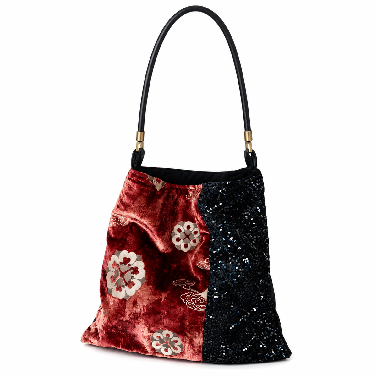 Red floral velvet and black sequin shoulder bag, three-quarter view on white.